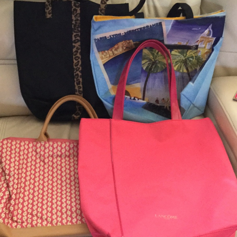 FOUR BAGS  NEVER USED